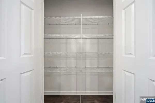 a bathroom with a glass shower door
