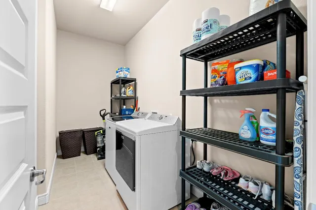 a view of a utility room with washer and dryer