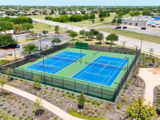 a view of a chairs and table in the terrace