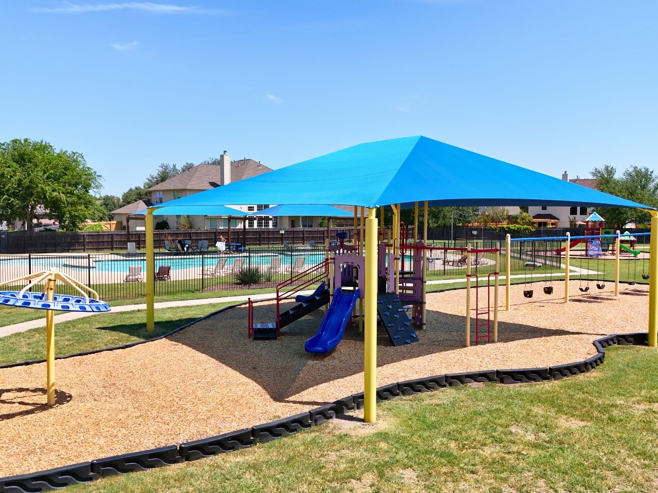 3501 Great Knot Pass Pflugerville, TX 78660 - Photo 36 of 40 a view of a house with swimming pool