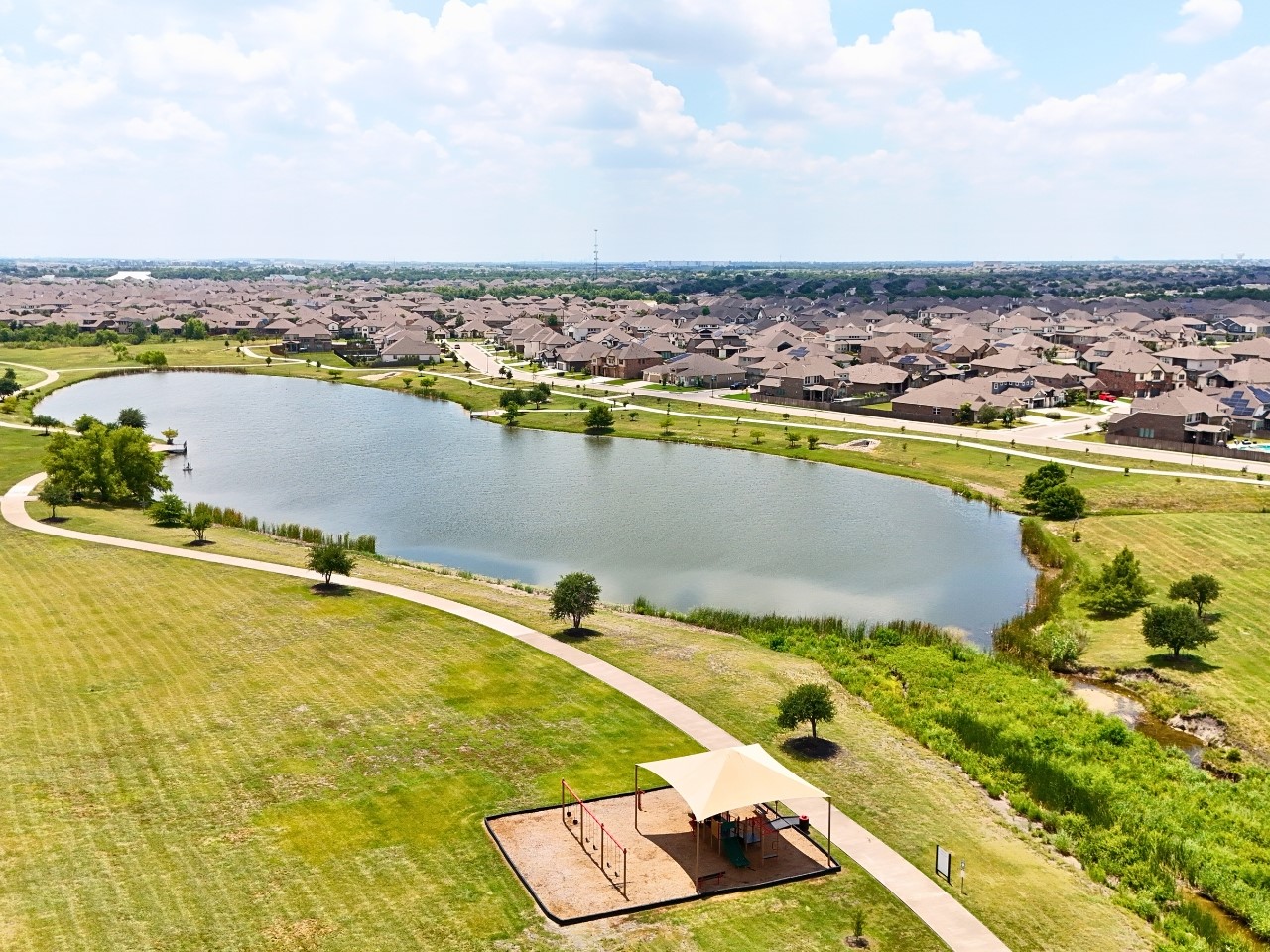 3501 Great Knot Pass Pflugerville, TX 78660 - Photo 37 of 40 an aerial view of a swimming pool and lake view