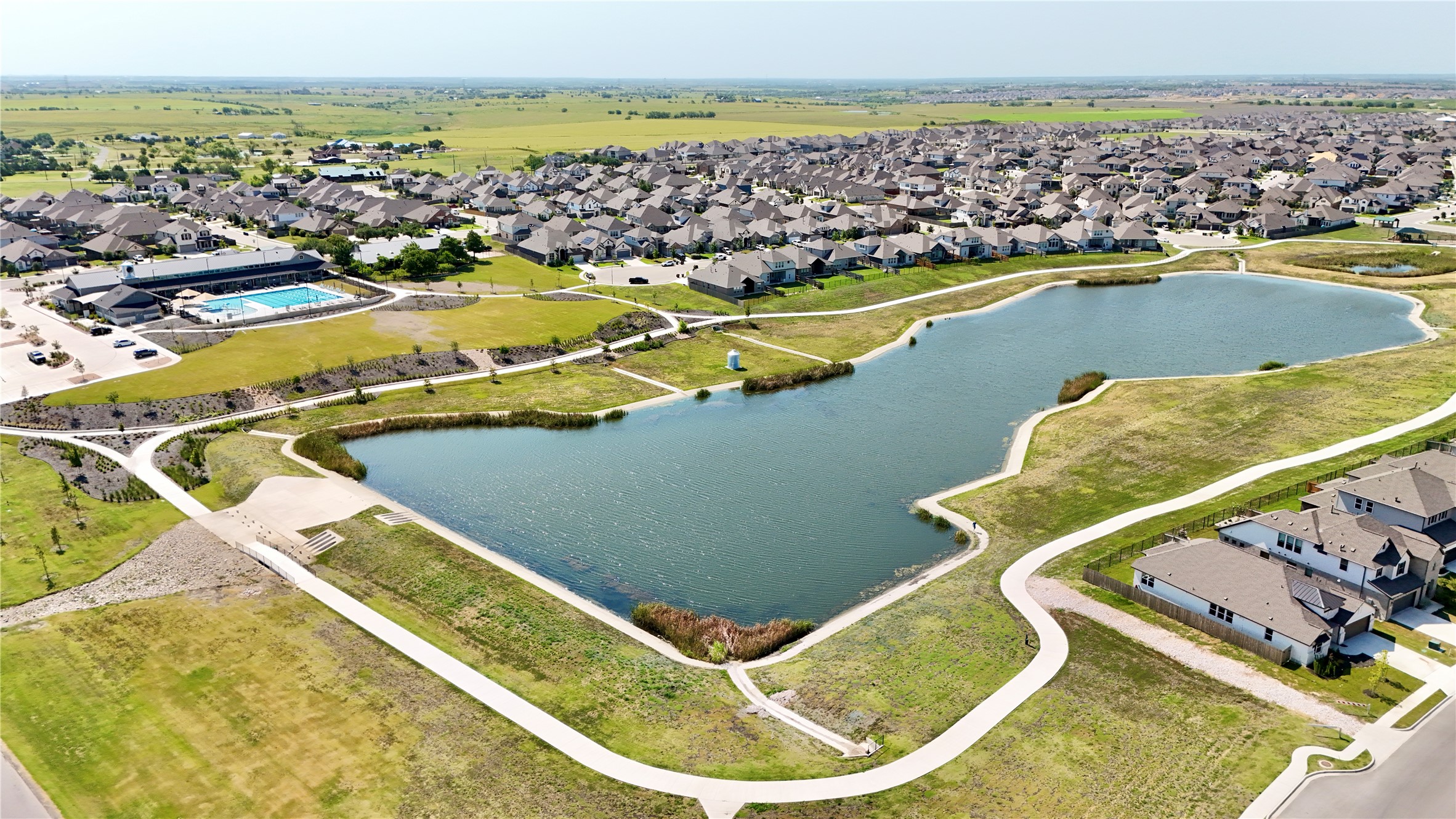 3501 Great Knot Pass Pflugerville, TX 78660 - Photo 38 of 40 a view of a swimming pool with an ocean view