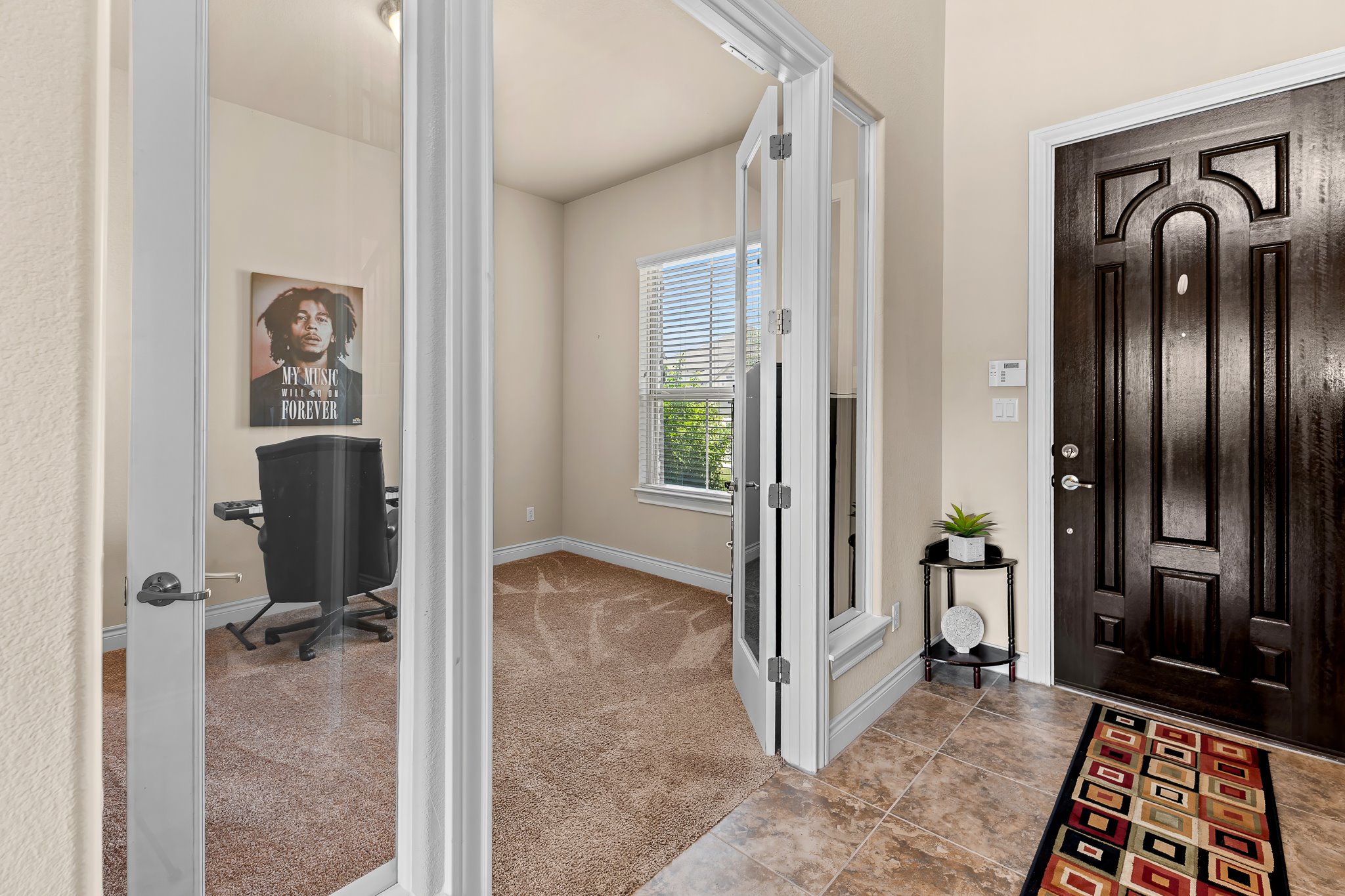 3501 Great Knot Pass Pflugerville, TX 78660 - Photo 4 of 40 a view of a hallway with closet and wooden floor