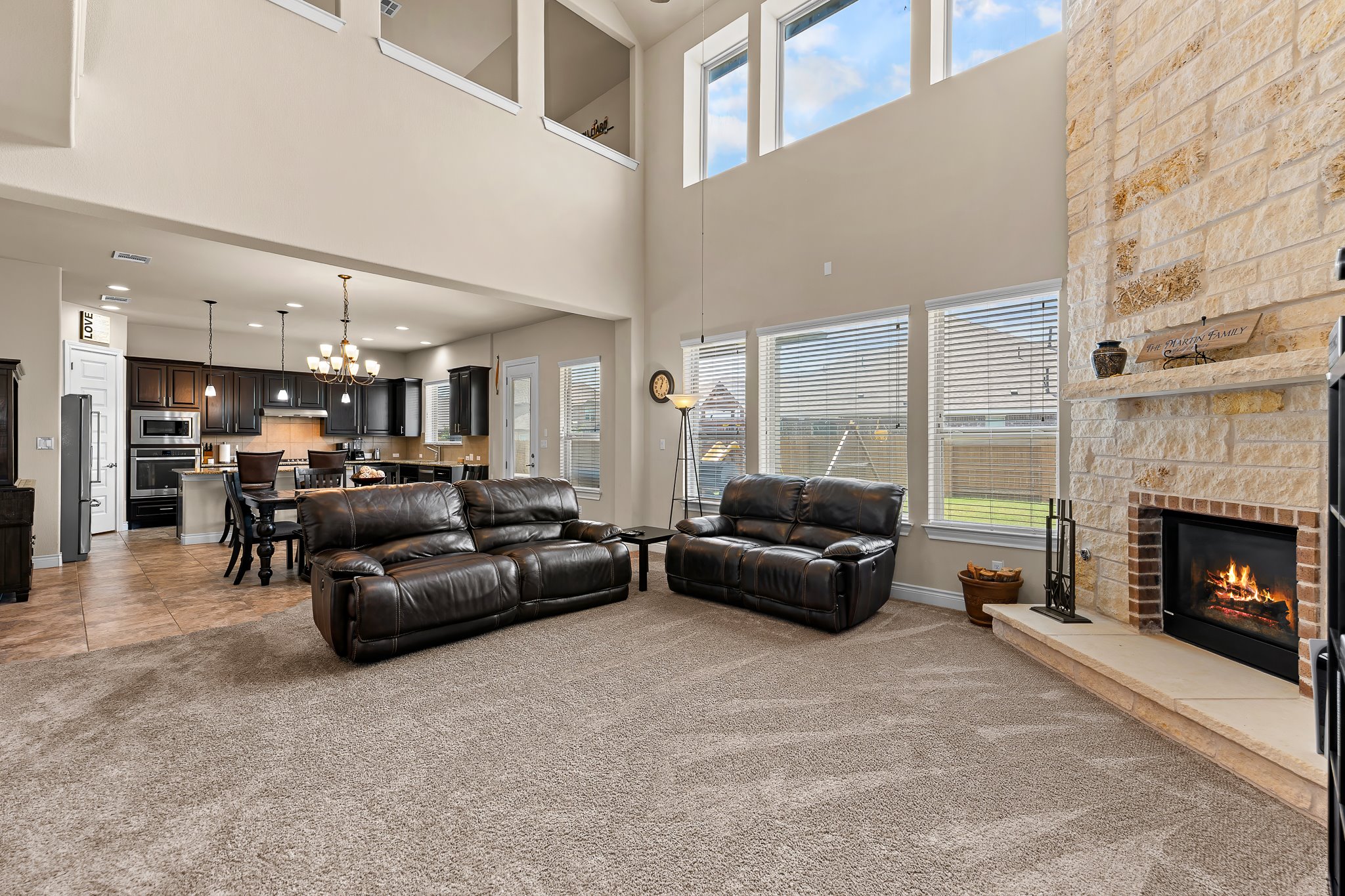 3501 Great Knot Pass Pflugerville, TX 78660 - Photo 6 of 40 a living room with furniture and a fireplace
