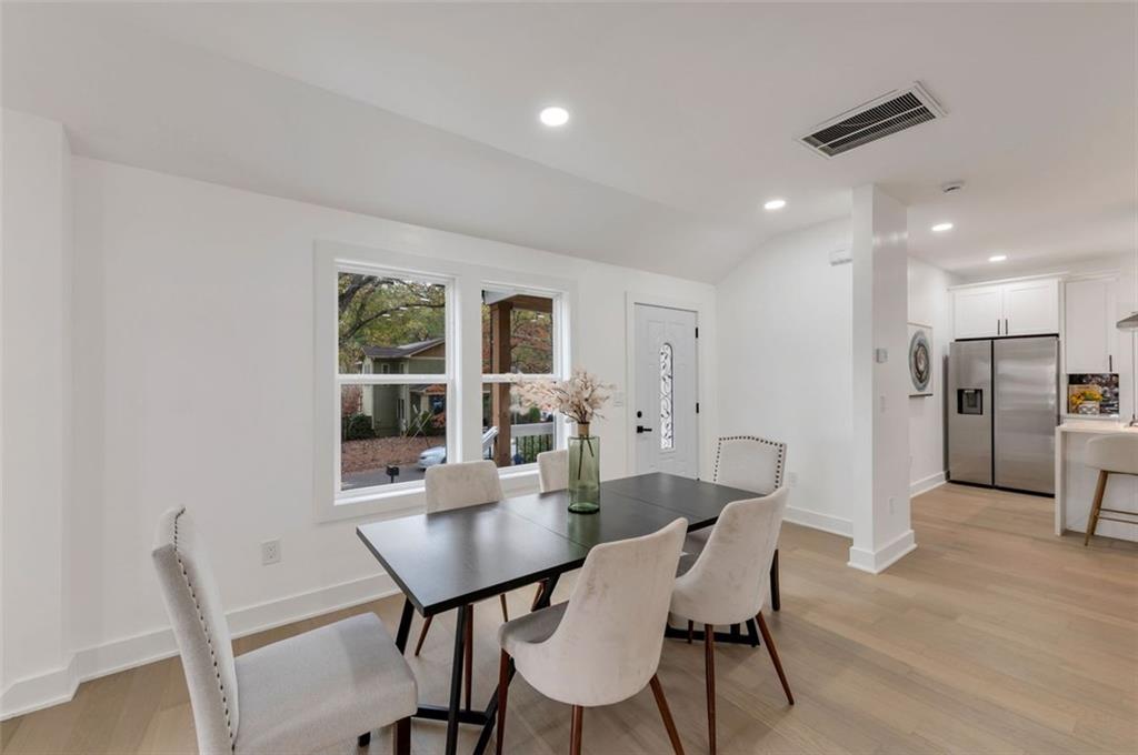 208 Watson Circle Southeast Atlanta, GA 30317 - Photo 11 of 45 a view of a dining room with furniture and wooden floor