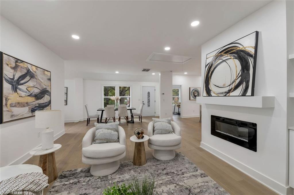 208 Watson Circle Southeast Atlanta, GA 30317 - Photo 15 of 45 a living room with furniture a rug and a fireplace