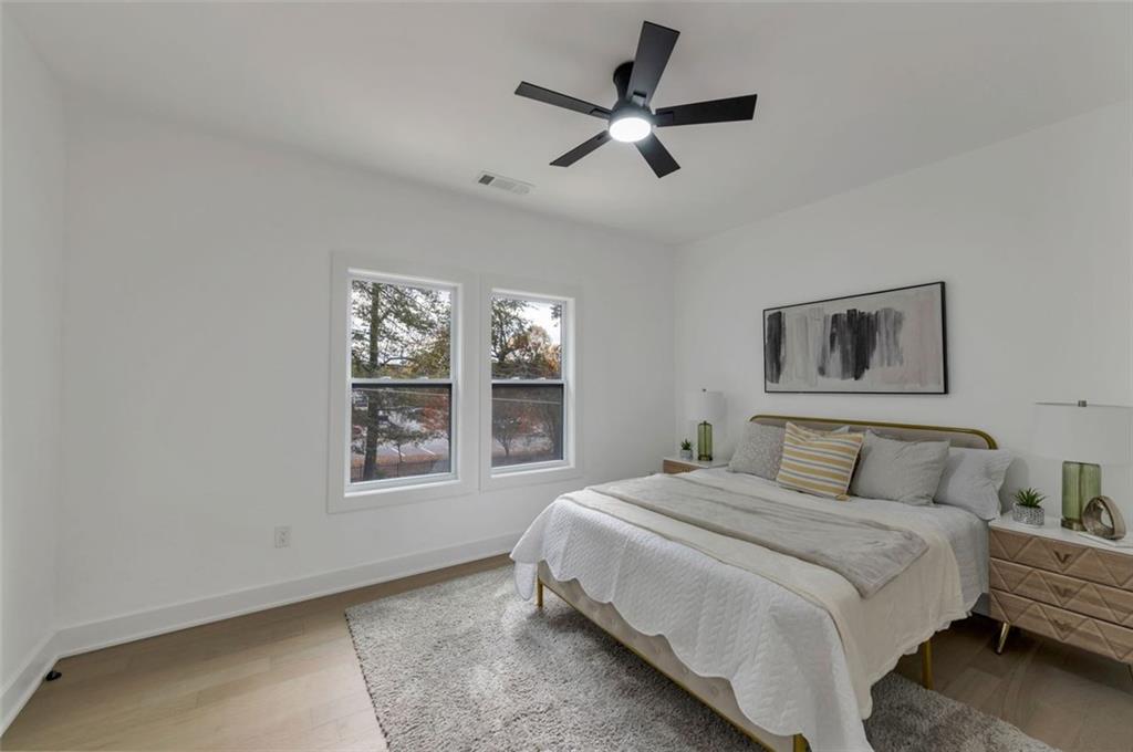 208 Watson Circle Southeast Atlanta, GA 30317 - Photo 34 of 45 a bedroom with a large bed and a window