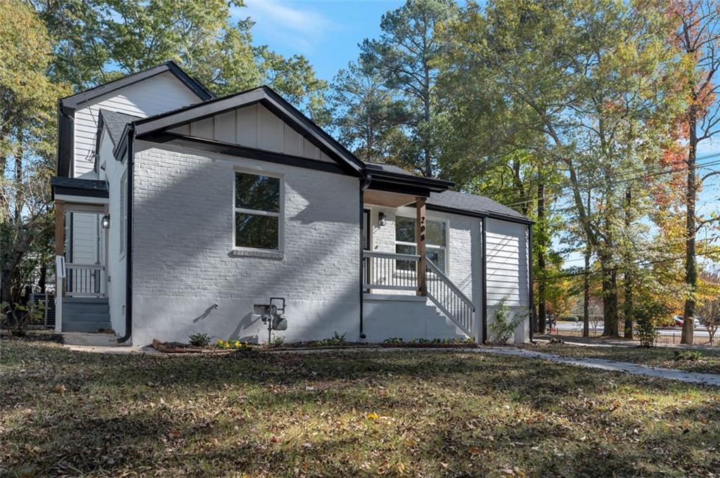 208 Watson Circle Southeast Atlanta, GA 30317 - Photo 43 of 45 a view of a house with backyard and trees