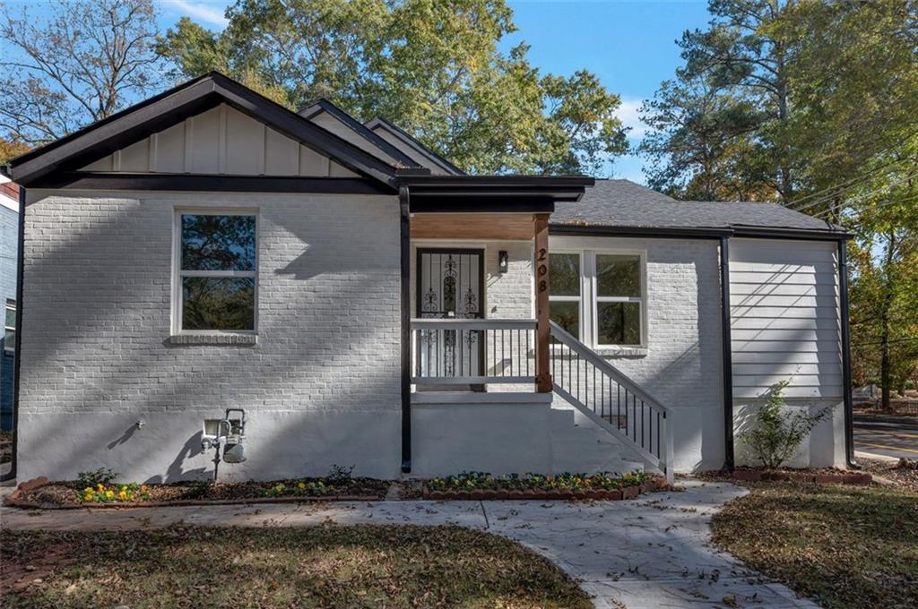 208 Watson Circle Southeast Atlanta, GA 30317 - Photo 44 of 45 a front view of a house with garden