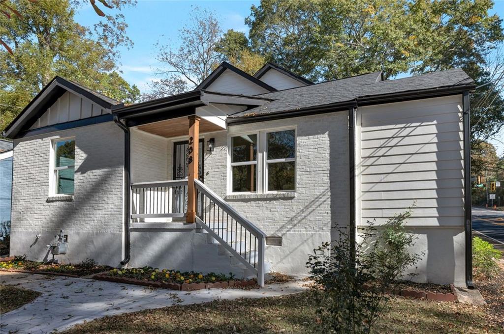 208 Watson Circle Southeast Atlanta, GA 30317 - Photo 5 of 45 a front view of a house with a yard