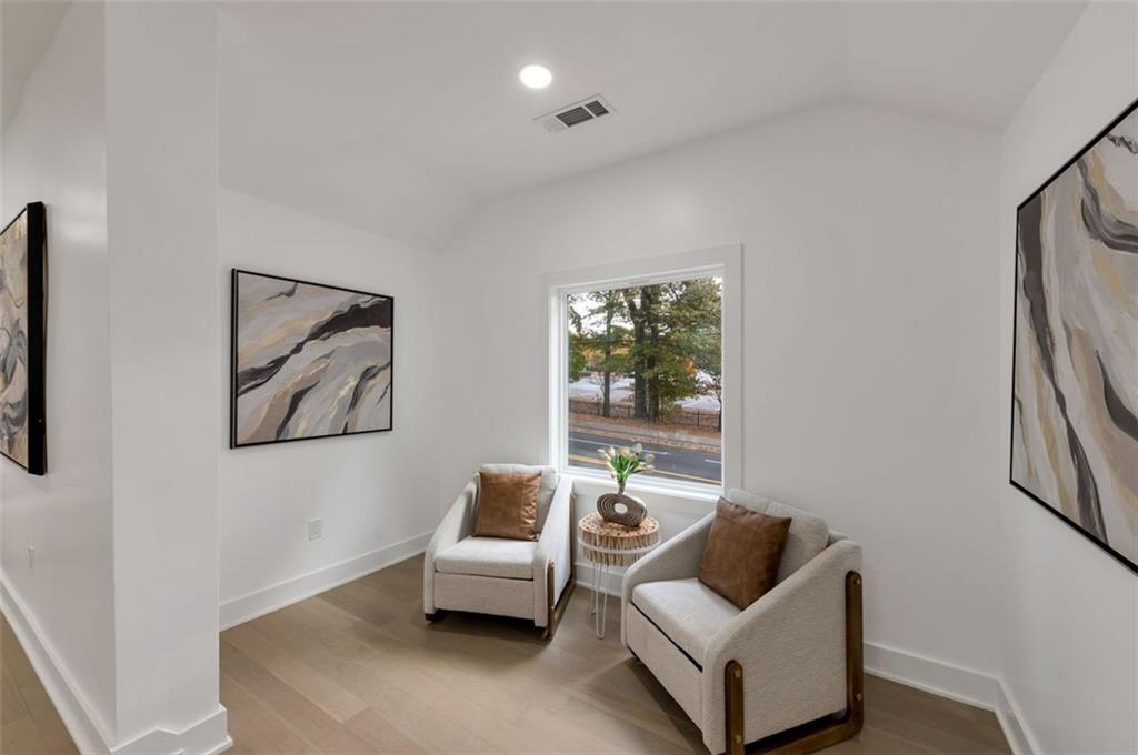 208 Watson Circle Southeast Atlanta, GA 30317 - Photo 9 of 45 a living room with furniture and a window