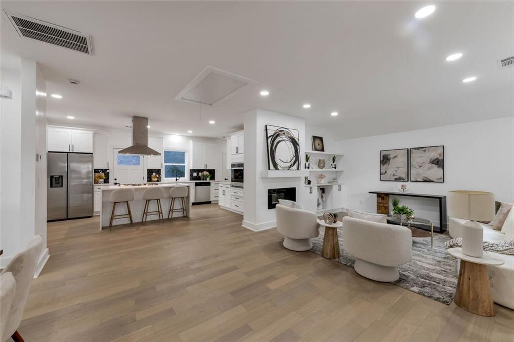 208 Watson Circle Southeast Atlanta, GA 30317 - Photo 10 of 45 a living room with furniture and a large window