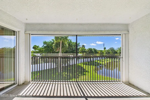 a kitchen with stainless steel appliances a stove a microwave and a sink