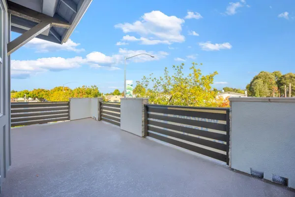 a view of outdoor space with deck and a garden