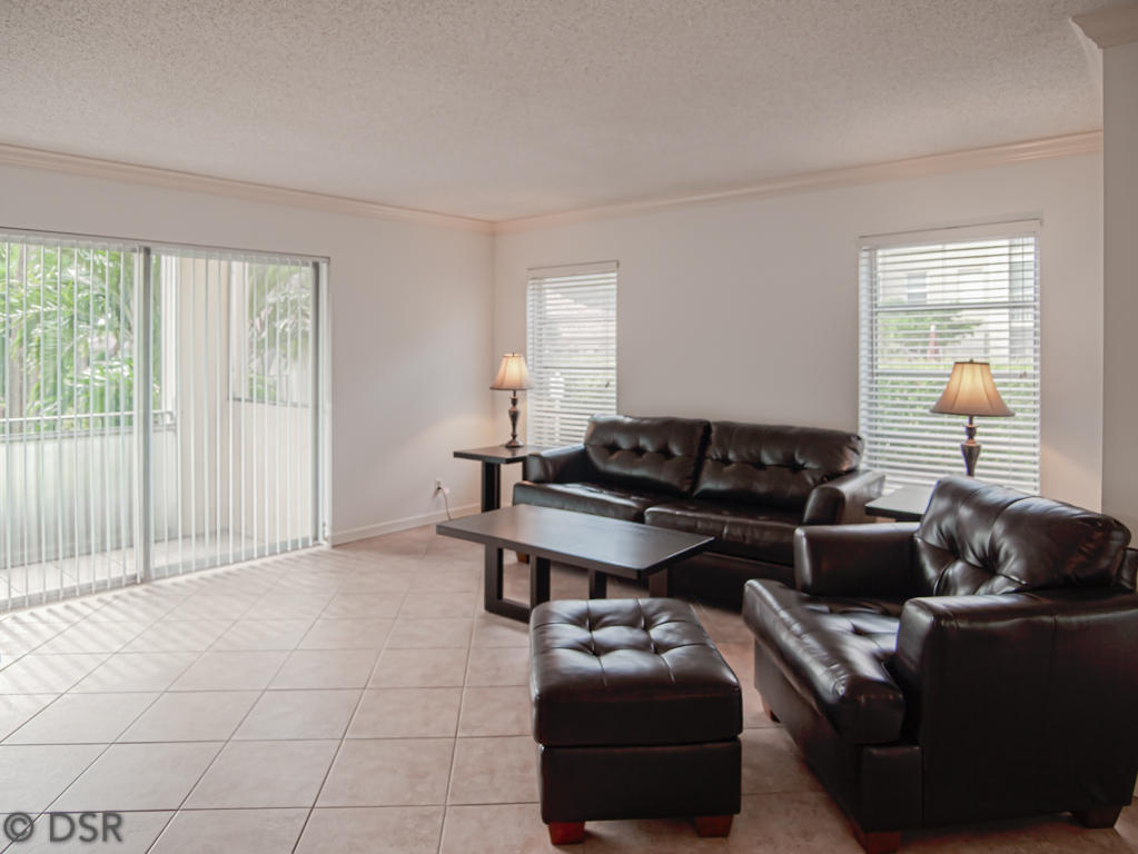 1111 South Ocean Boulevard, Unit 123 Boca Raton, FL 33432 - Photo 2 of 32 Bright Living Room