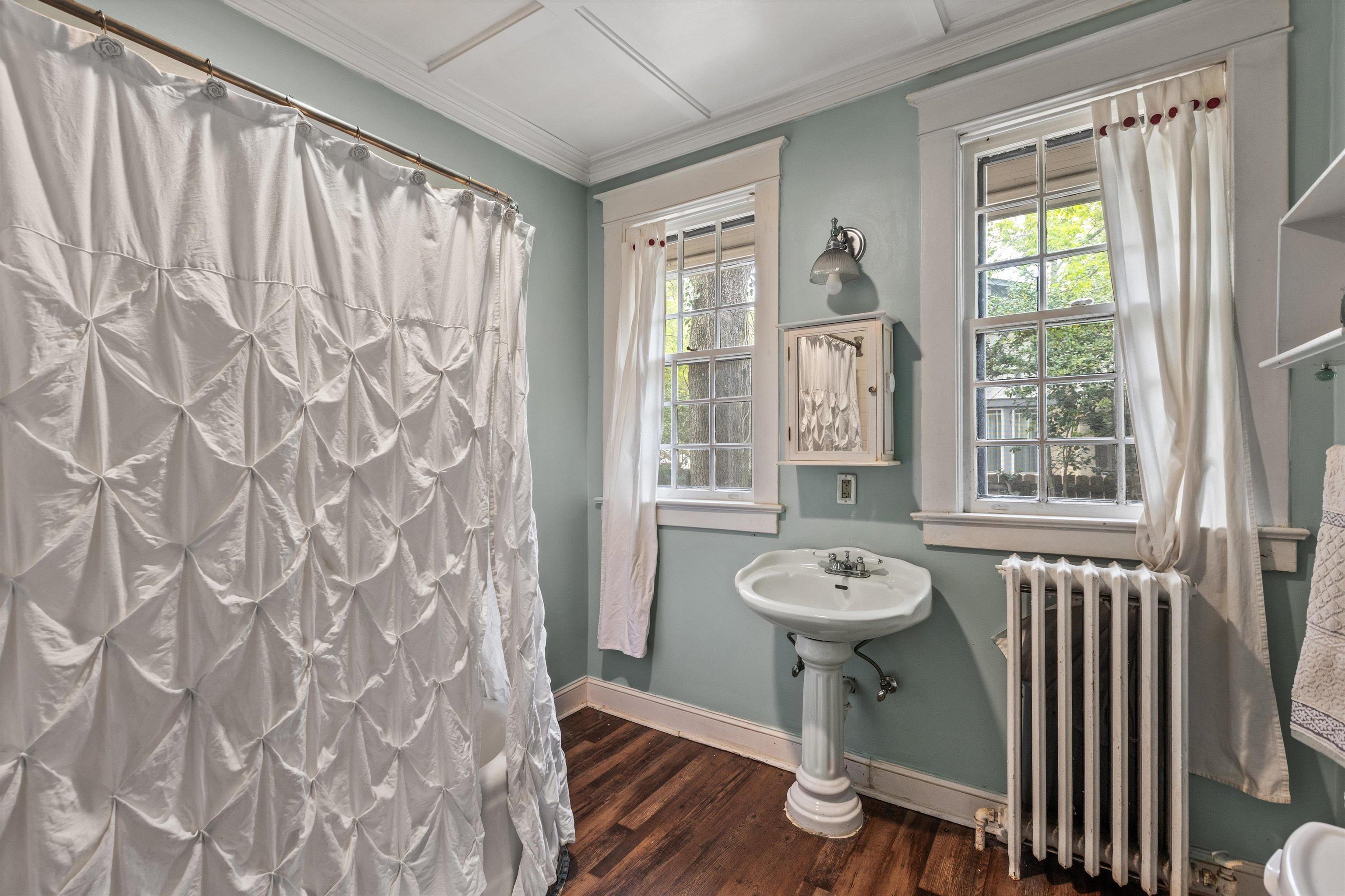 569 North Trezevant Street Memphis, TN 38112 - Photo 14 of 26 a view of a hallway with furniture and wooden floor