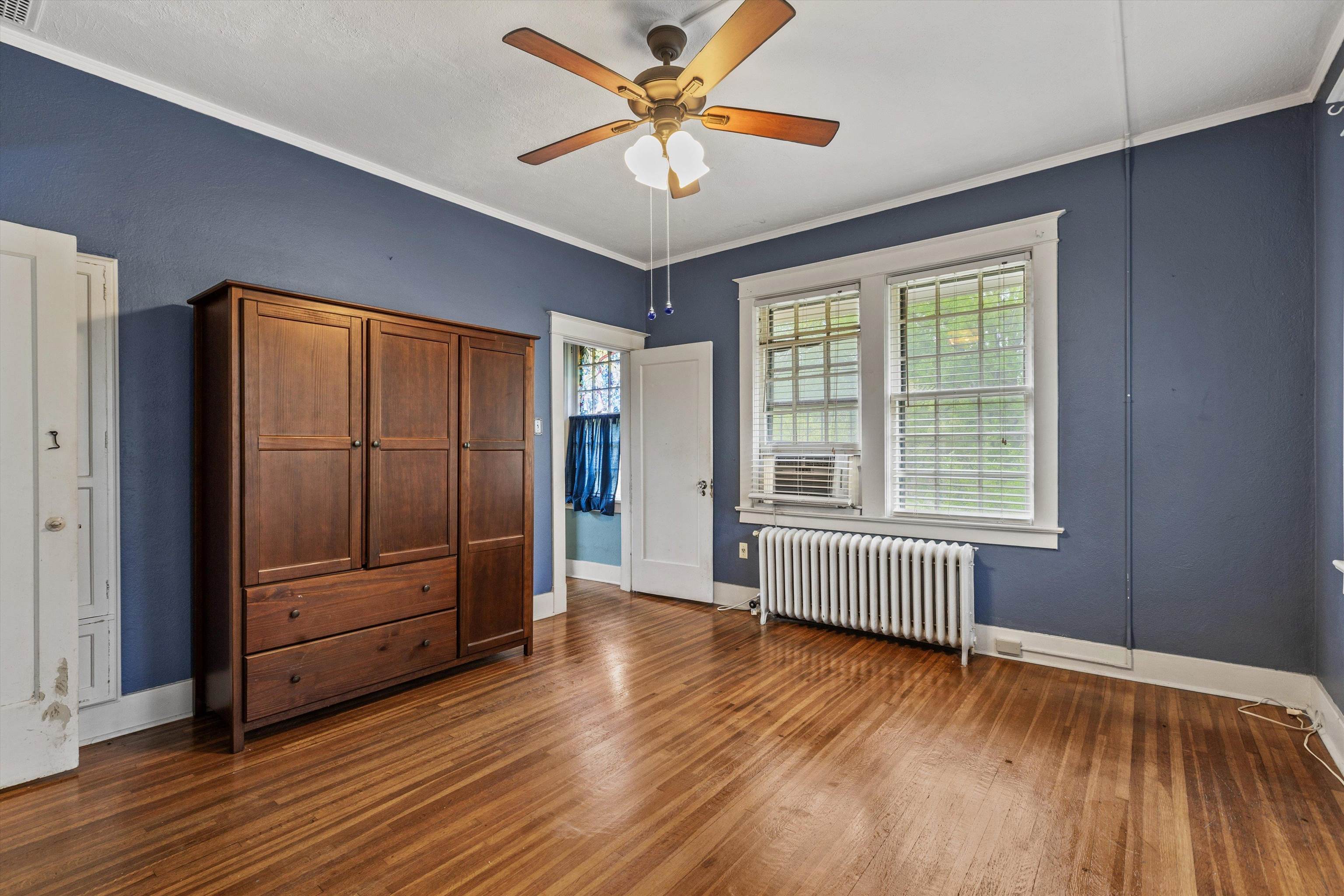 569 North Trezevant Street Memphis, TN 38112 - Photo 20 of 26 wooden floor in an empty room with a window