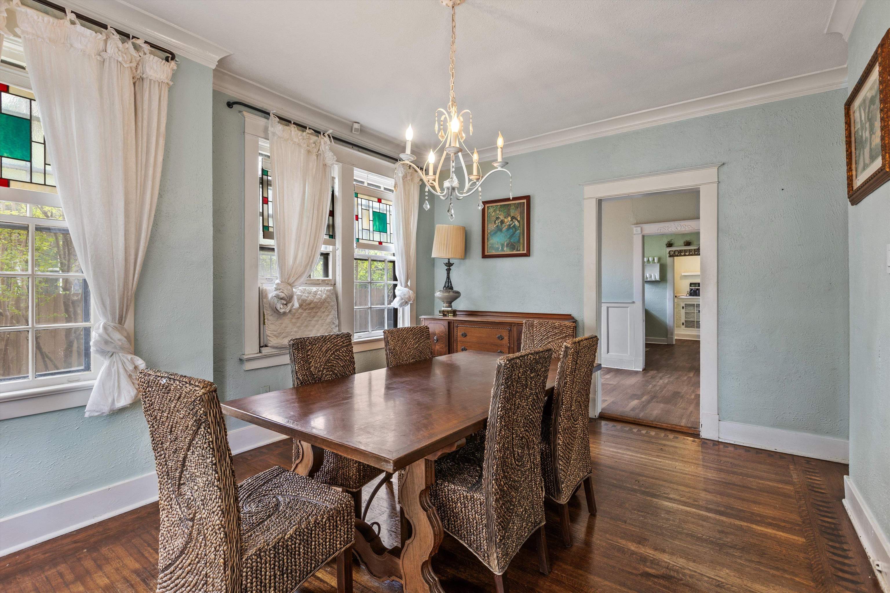 569 North Trezevant Street Memphis, TN 38112 - Photo 6 of 26 a view of a dining room with furniture window and wooden floor