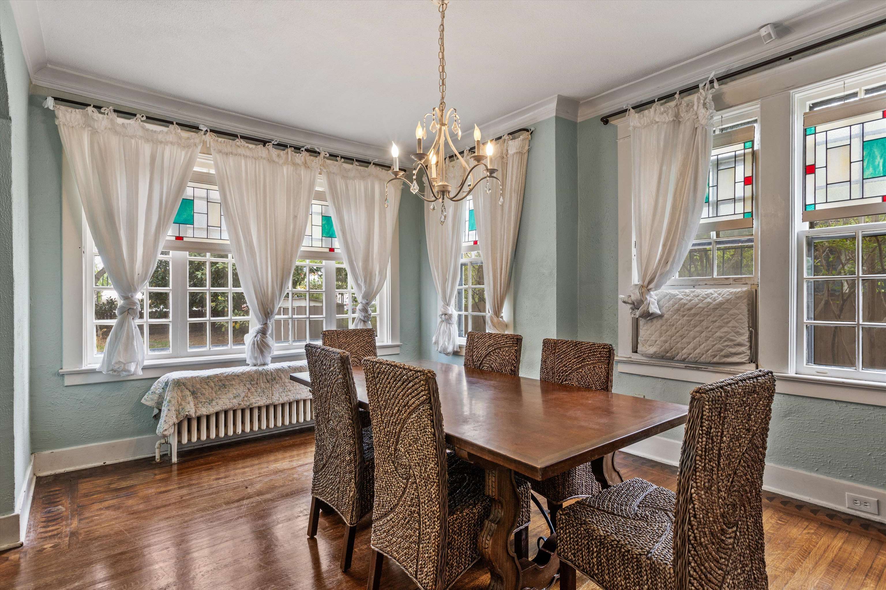 569 North Trezevant Street Memphis, TN 38112 - Photo 7 of 26 a view of a dining room with furniture window and wooden floor