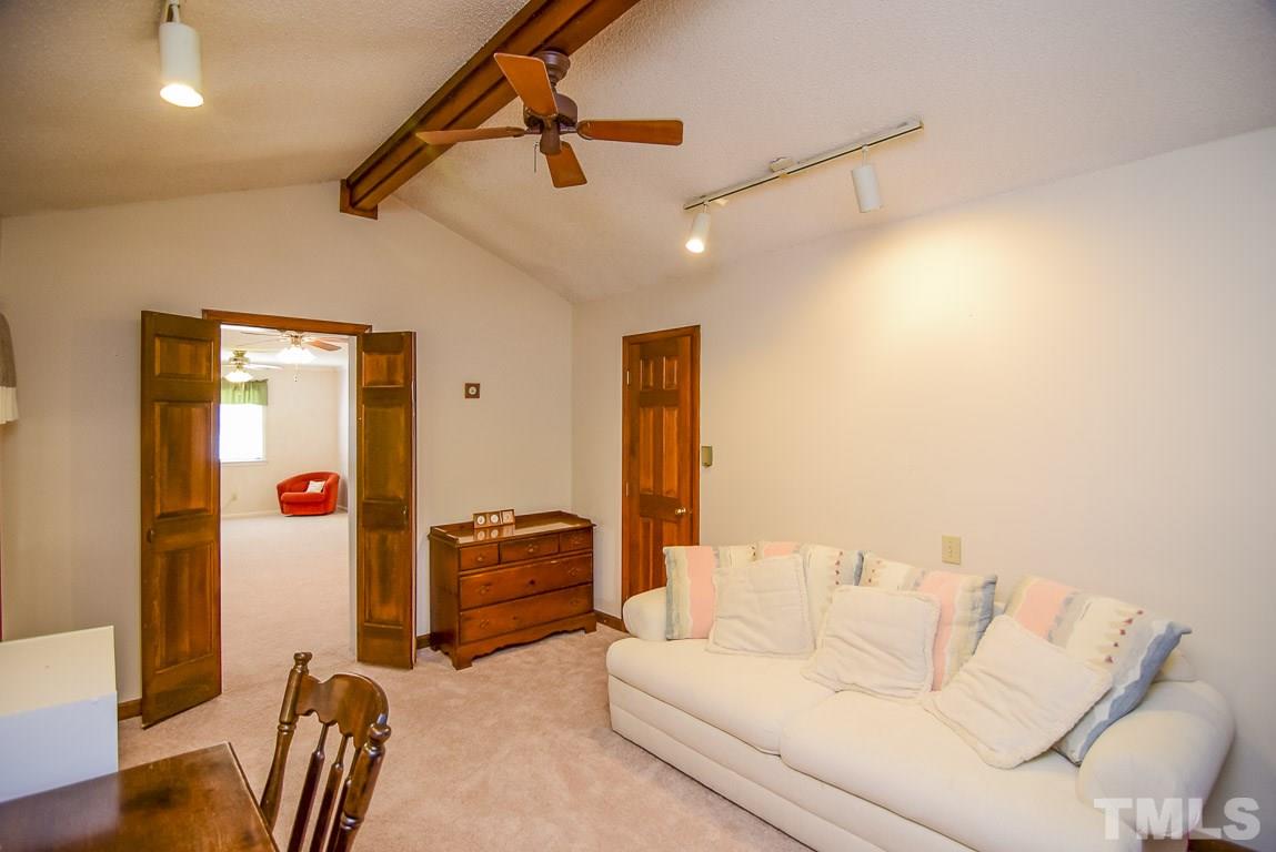 3921 Live Oak Road Raleigh, NC 27604 - Photo 22 of 25 a living room with furniture