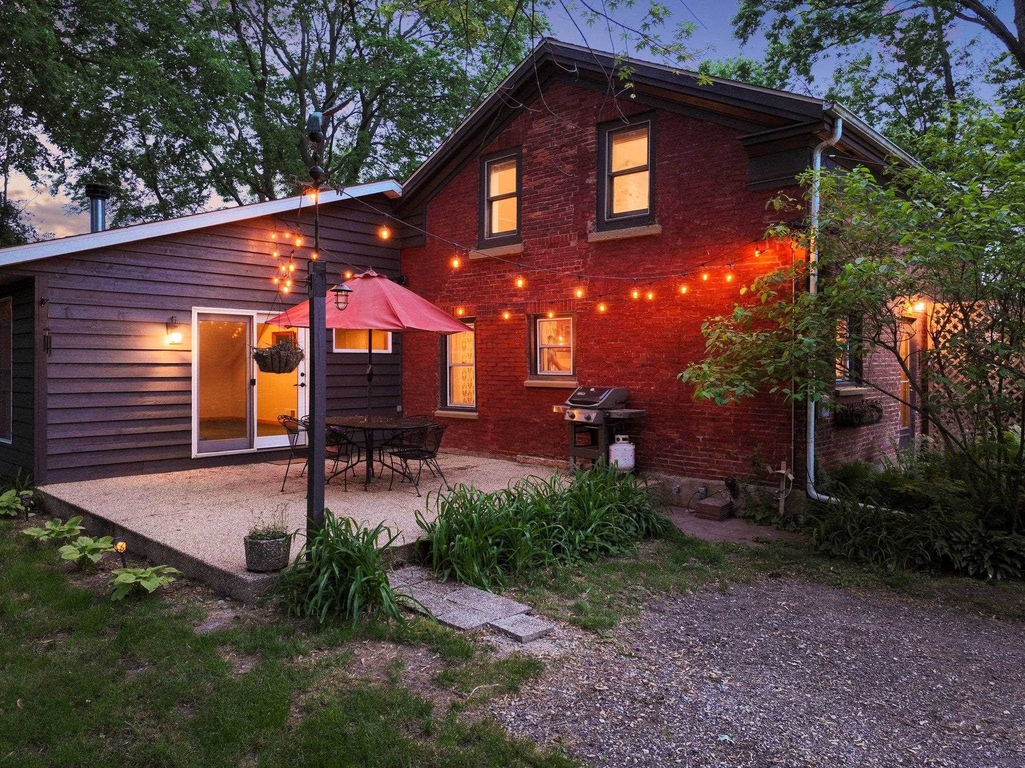 14657 Prairie Road Rockton, IL 61072 - Photo 13 of 55 a backyard of a house with table and chairs