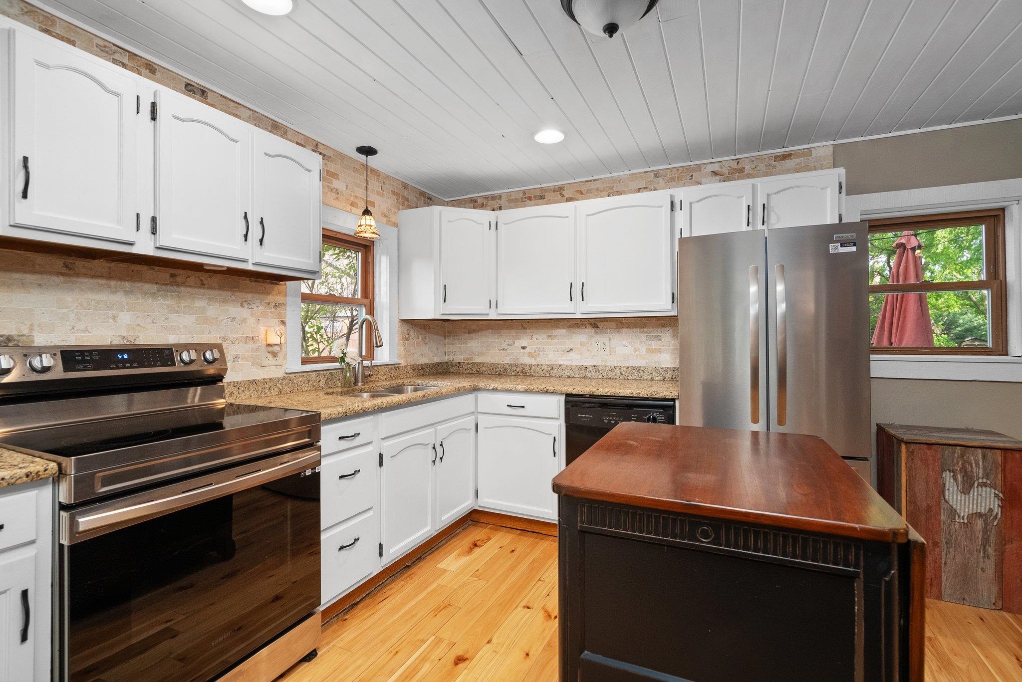 14657 Prairie Road Rockton, IL 61072 - Photo 19 of 55 a kitchen with a stove microwave and refrigerator