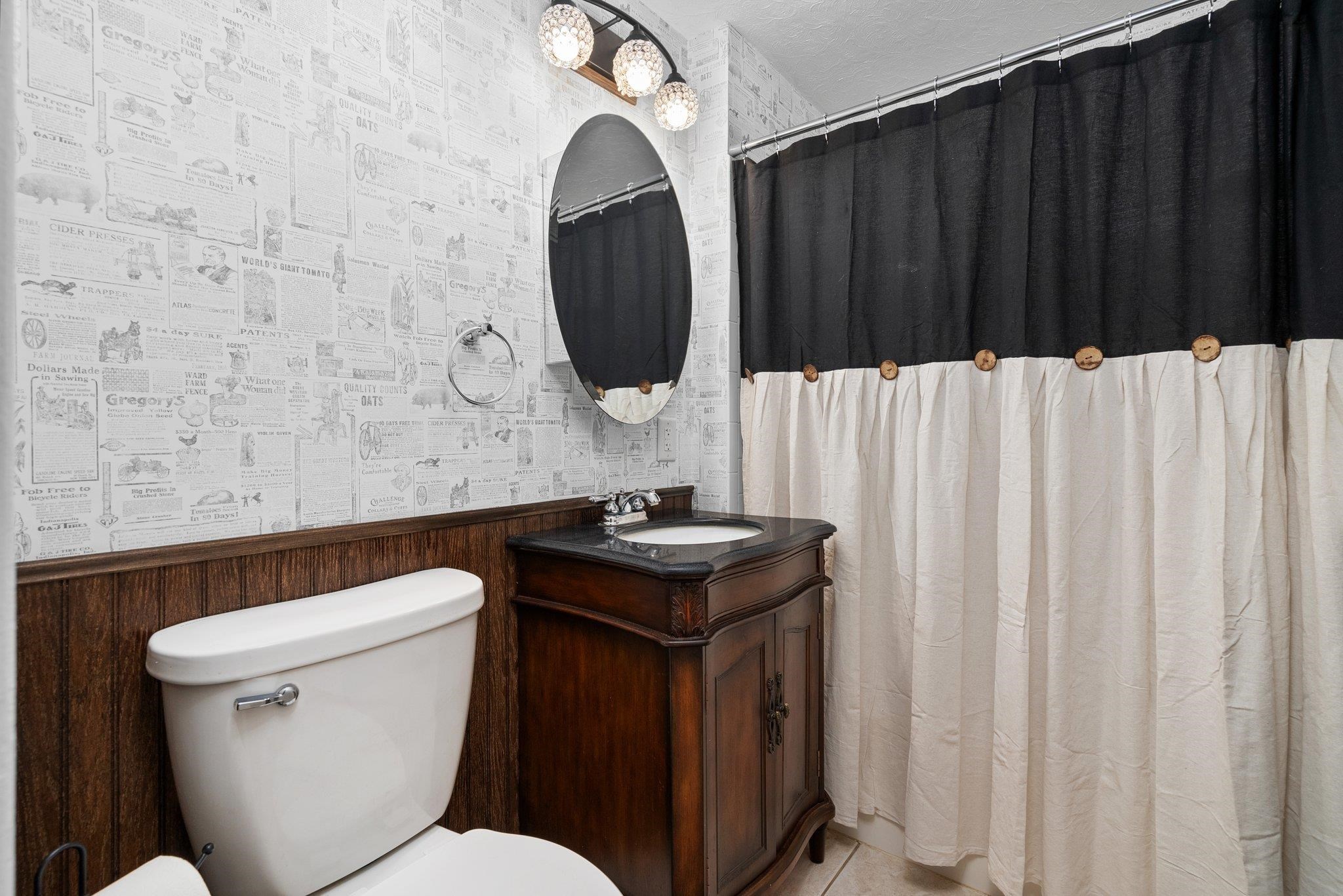 14657 Prairie Road Rockton, IL 61072 - Photo 22 of 55 a bathroom with a sink toilet and vanity