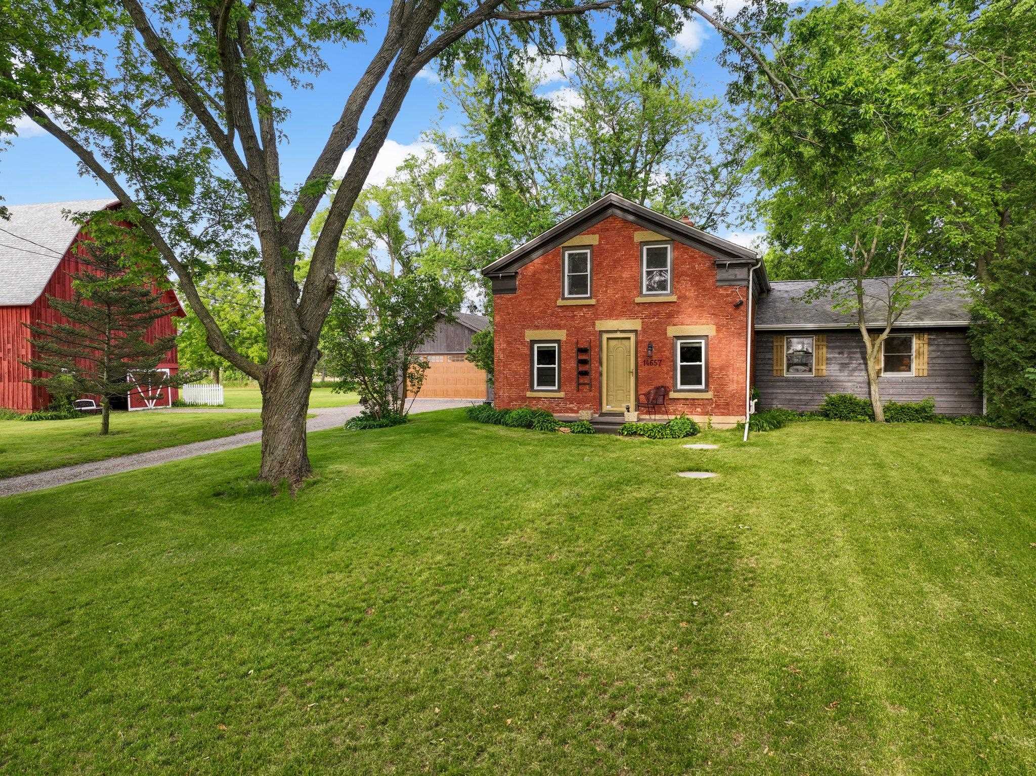 14657 Prairie Road Rockton, IL 61072 - Photo 3 of 55 a front view of house with yard and green space