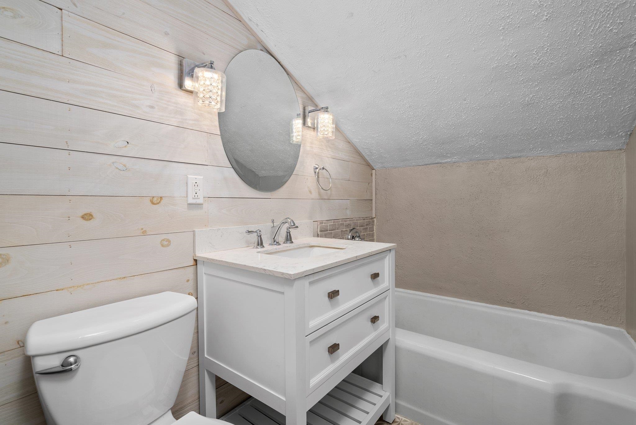14657 Prairie Road Rockton, IL 61072 - Photo 34 of 55 a bathroom with a sink a toilet and bathtub