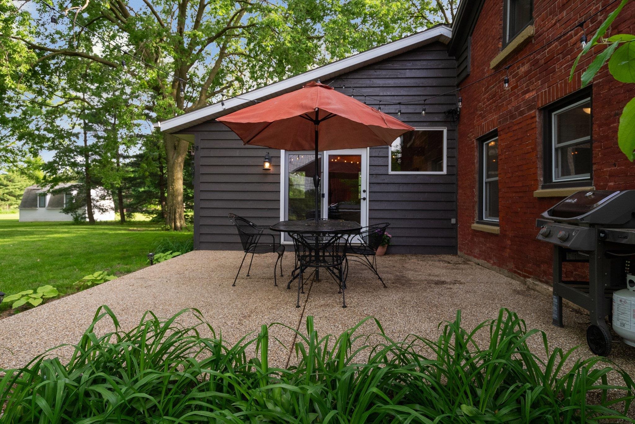 14657 Prairie Road Rockton, IL 61072 - Photo 38 of 55 a view of a house with backyard and sitting area