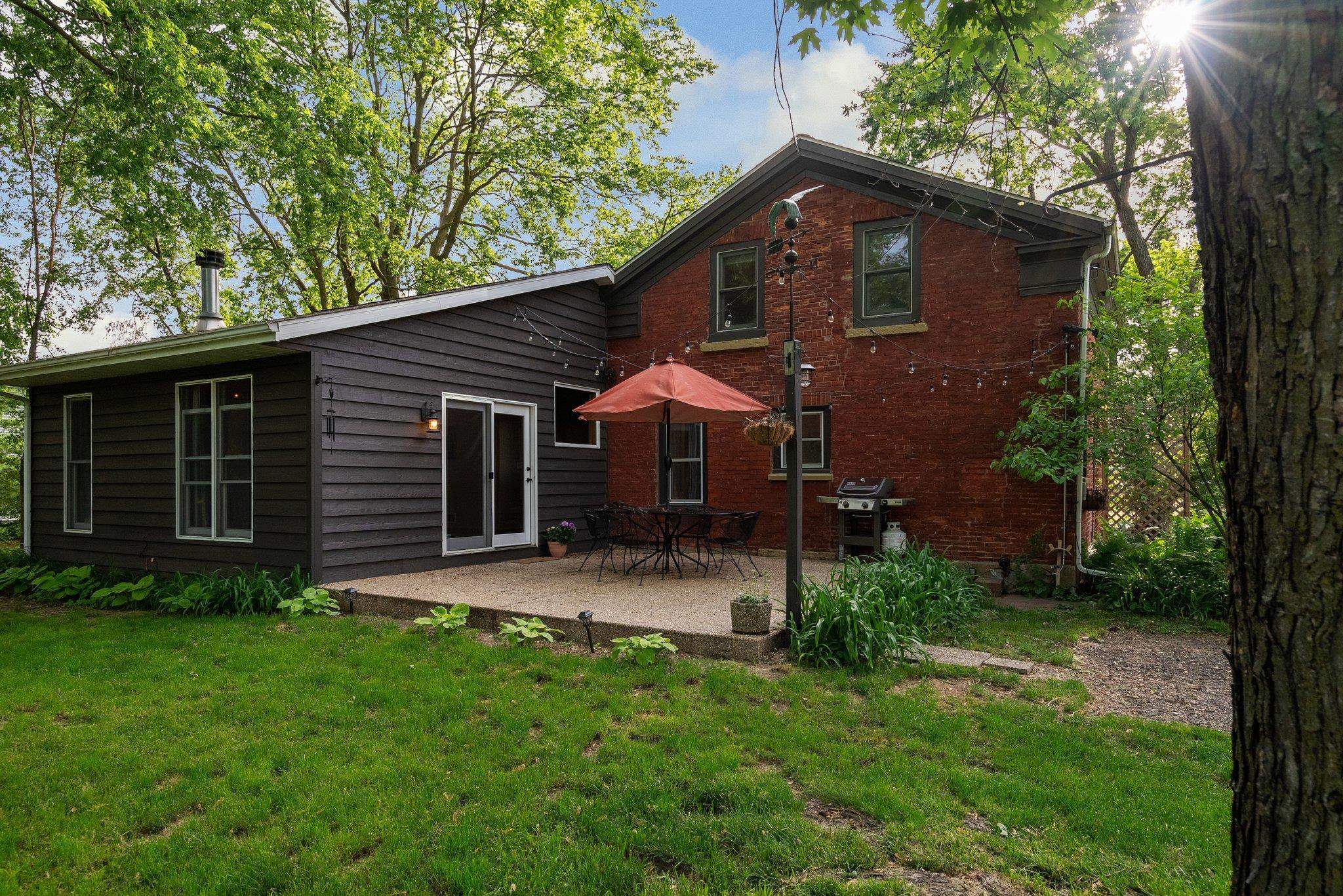 14657 Prairie Road Rockton, IL 61072 - Photo 39 of 55 a front view of a house with a yard and porch