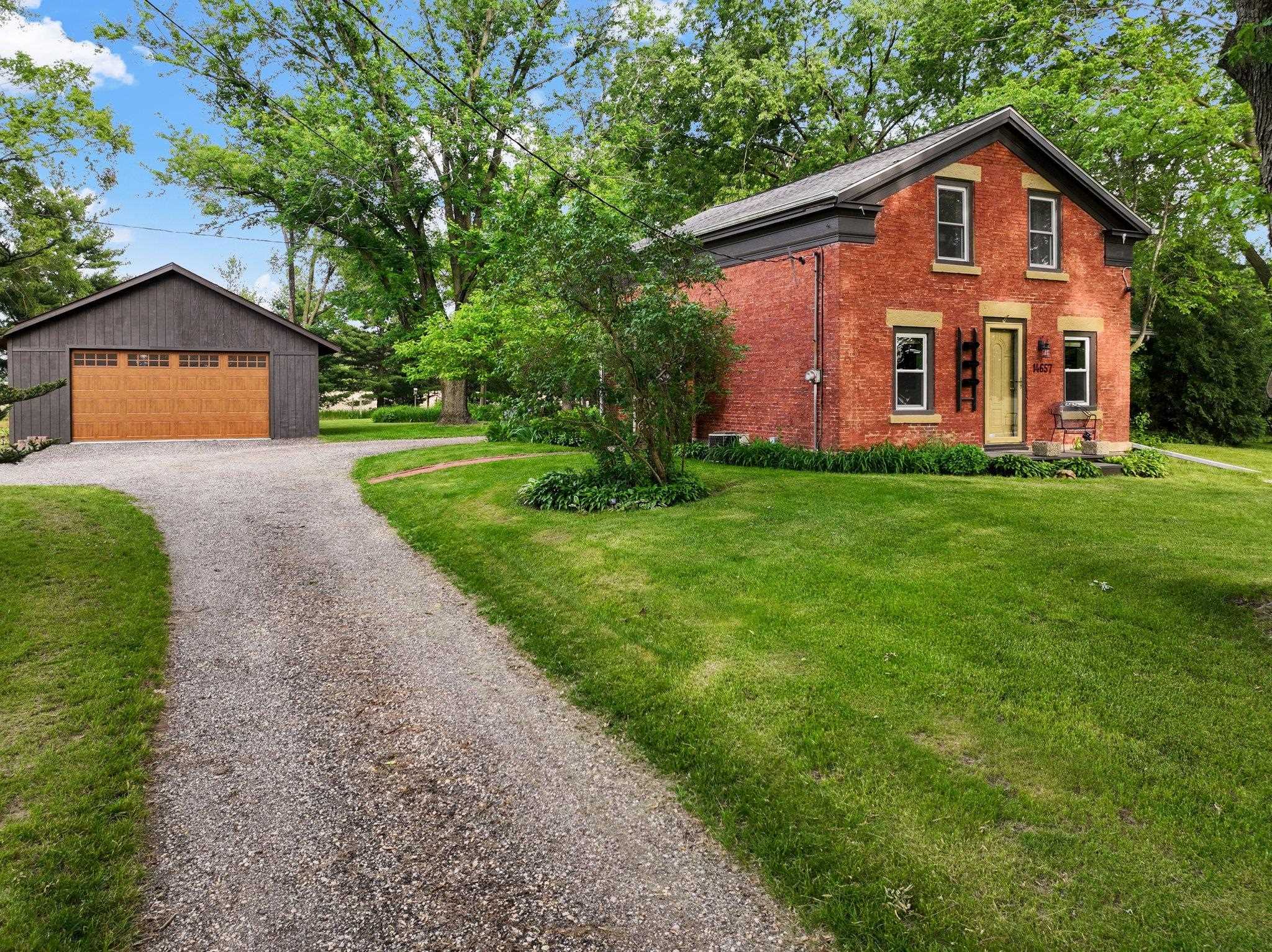 14657 Prairie Road Rockton, IL 61072 - Photo 4 of 55 a view of a house with a yard