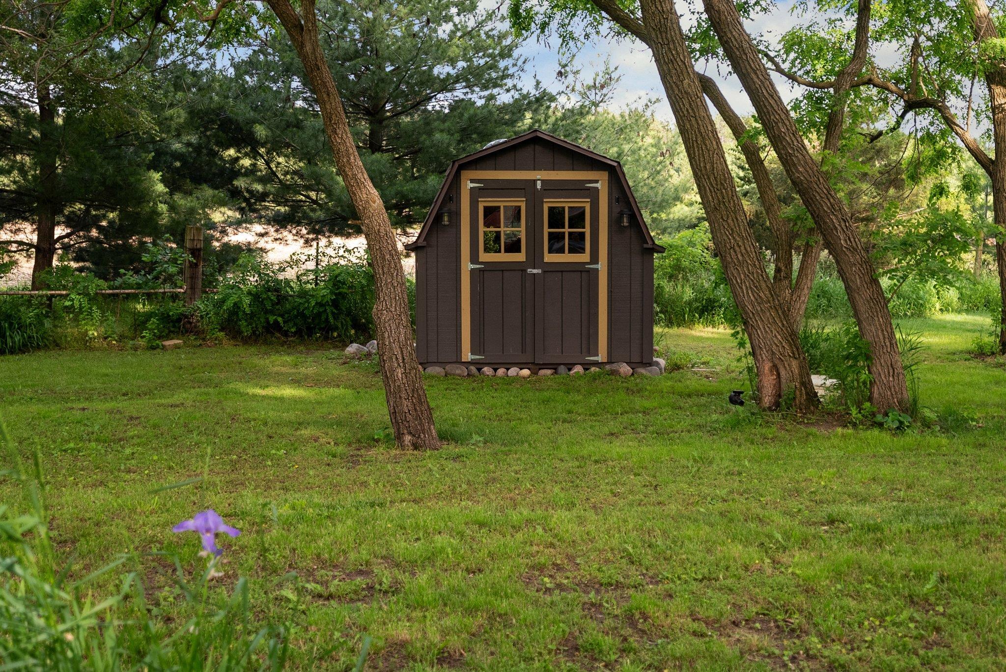 14657 Prairie Road Rockton, IL 61072 - Photo 41 of 55 a front view of a house with garden