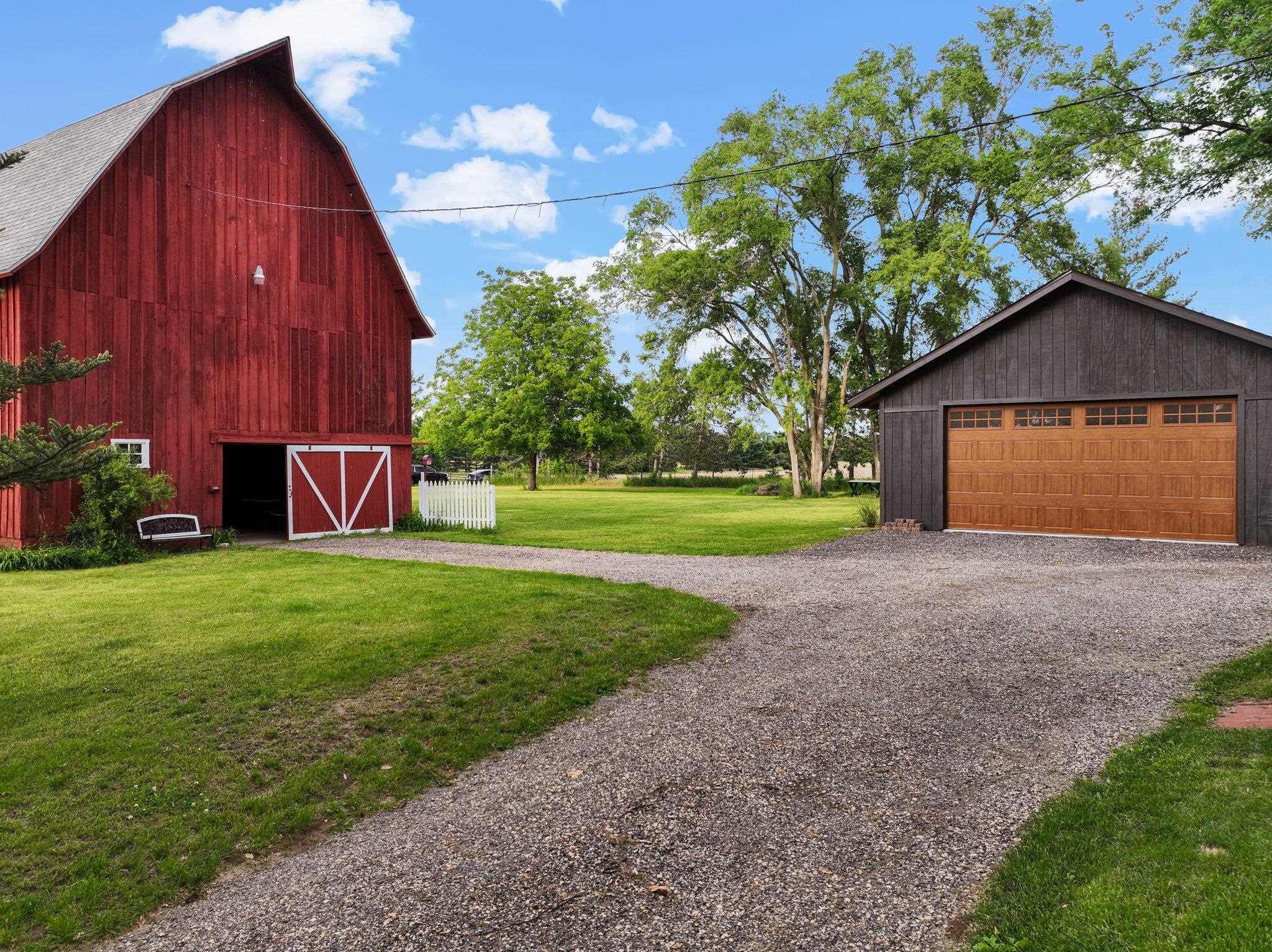 14657 Prairie Road Rockton, IL 61072 - Photo 5 of 55 a view of a house with backyard and garden
