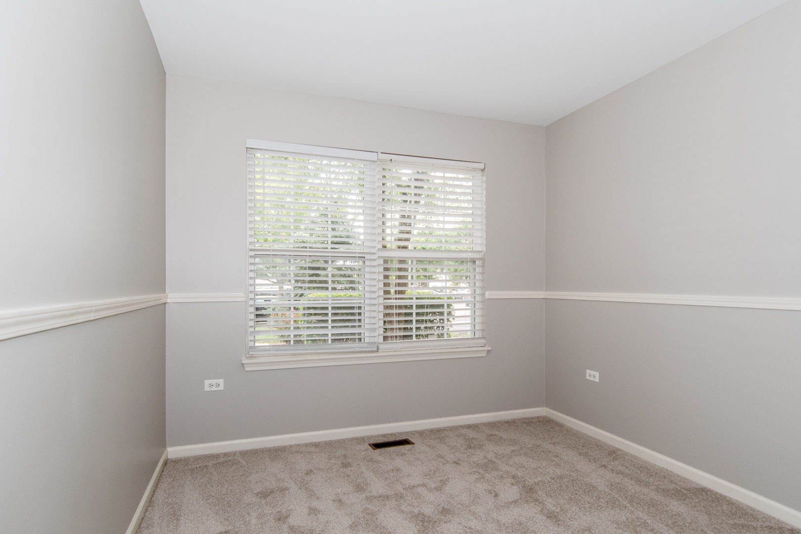 2819 Rutland Circle, Unit 103 Naperville, IL 60564 - Photo 13 of 25 a view of an empty room with a window
