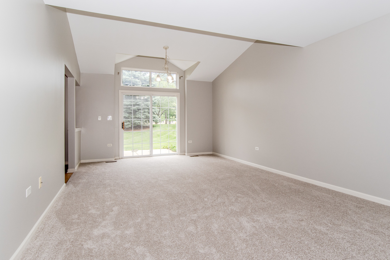 2819 Rutland Circle, Unit 103 Naperville, IL 60564 - Photo 3 of 25 a view of a room with large windows