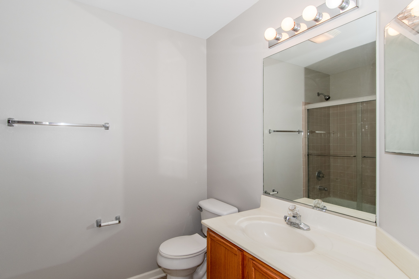 2819 Rutland Circle, Unit 103 Naperville, IL 60564 - Photo 7 of 25 a bathroom with a sink toilet and shower