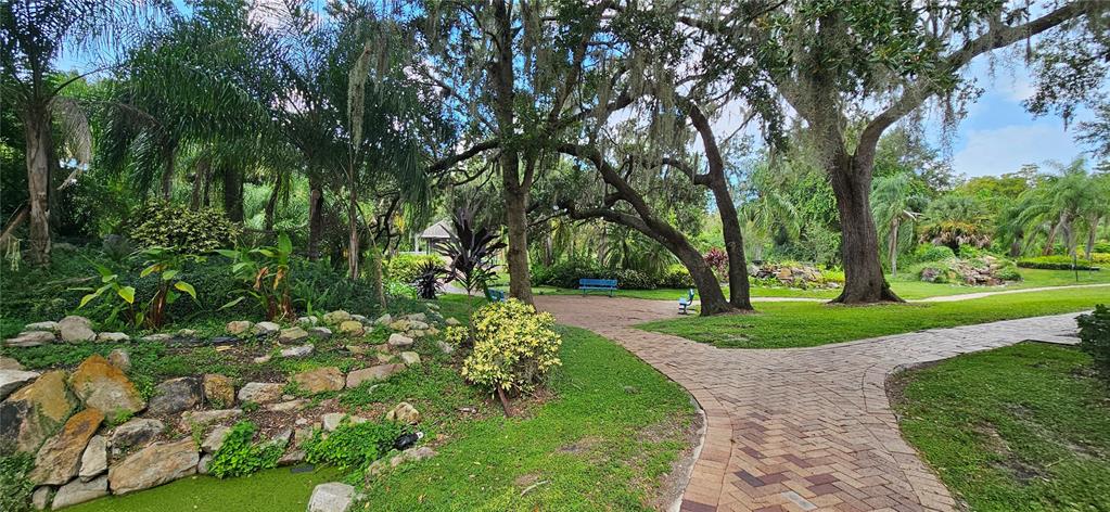 4340 South Kirkman Road, Unit 912 Orlando, FL 32811 - Photo 15 of 21 a view of a park with large trees