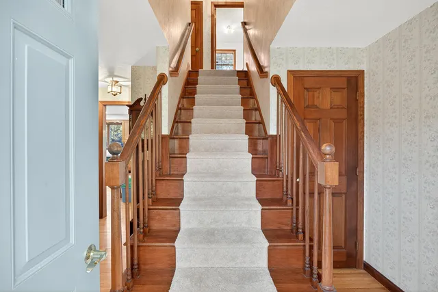 a view of an entryway with staircase