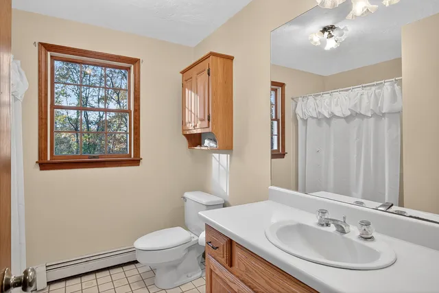 a kitchen with granite countertop a sink and a window