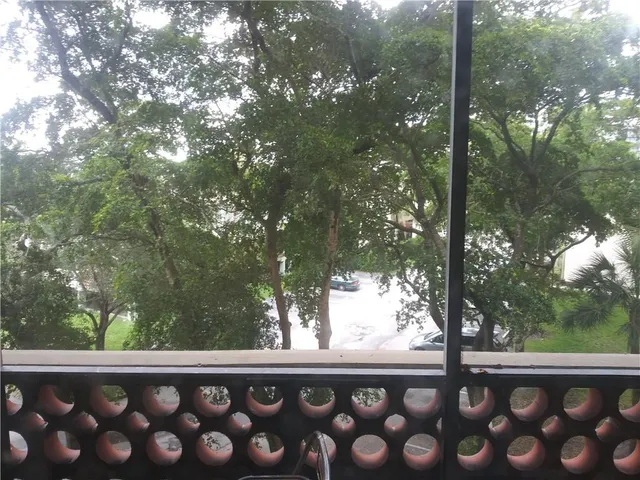 a view of a wooden fence