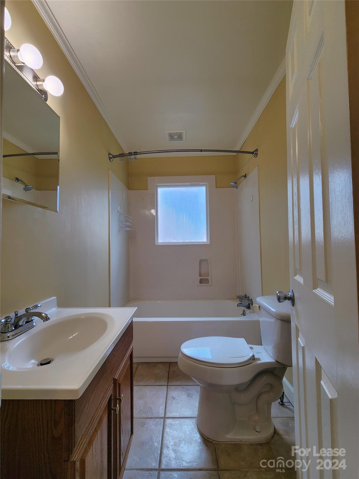 2117 Oakdale Road Charlotte, NC 28216 - Photo 12 of 20 a bathroom with a sink toilet and shower