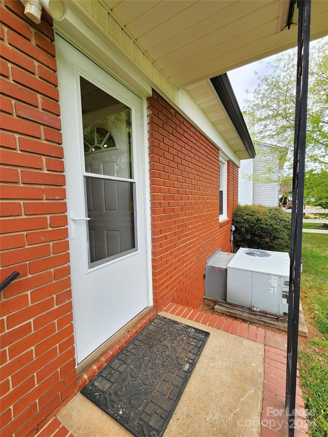 2117 Oakdale Road Charlotte, NC 28216 - Photo 17 of 20 a view of house with backyard