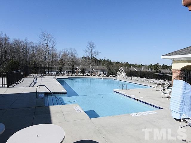 5013 Echo Ridge Road Raleigh, NC 27612 - Photo 14 of 15 a view of outdoor space yard and swimming pool