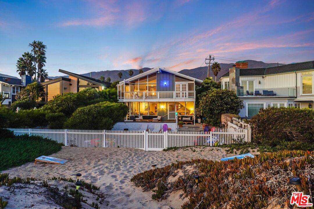 30800 Broad Beach Road Malibu, CA 90265 - Photo 25 of 27 a front view of a house with a yard