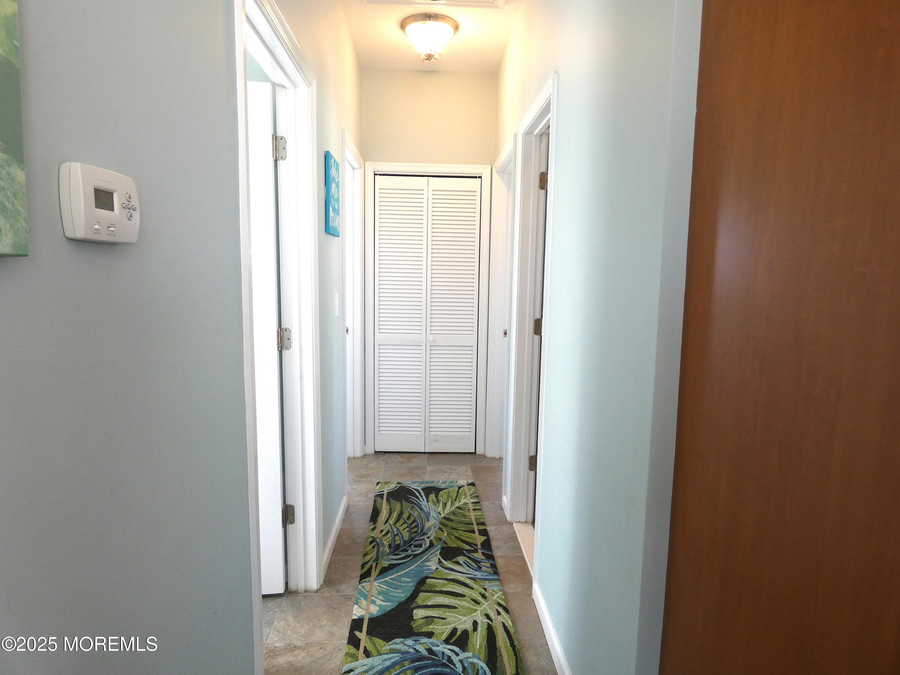 3311 Seaview Road Lavallette, NJ 08735 - Photo 22 of 27 a view of a hallway with interior of the house