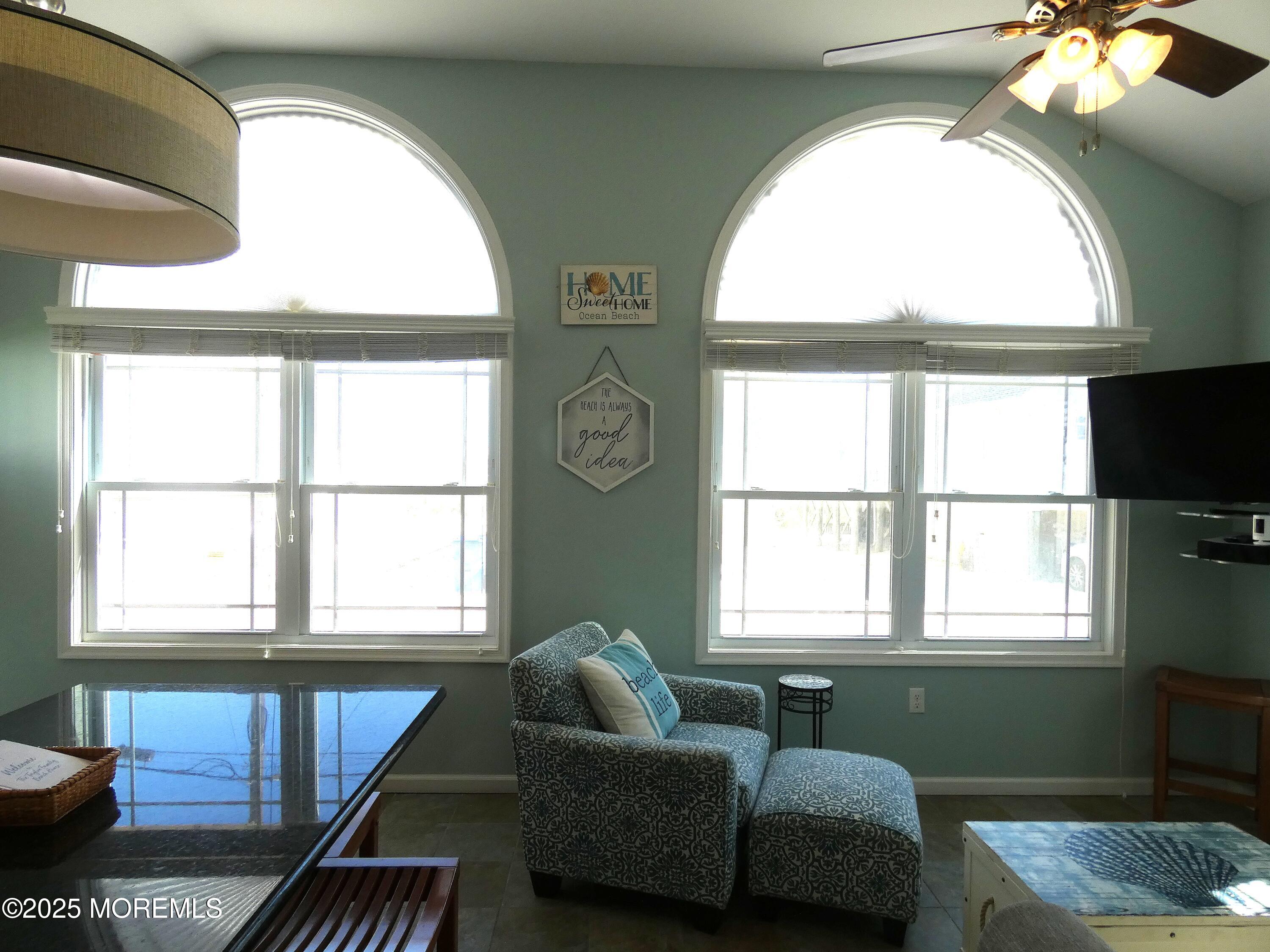 3311 Seaview Road Lavallette, NJ 08735 - Photo 9 of 27 a living room with furniture and a window