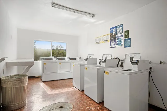 a view of a house with pool porch and sitting area