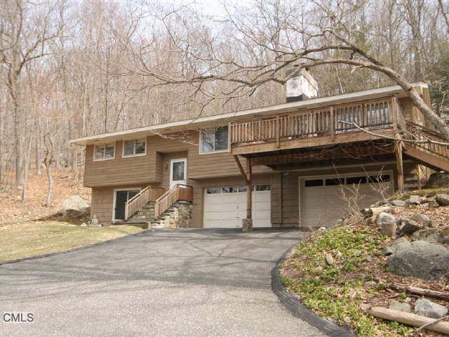 54 Florida Road Ridgefield, CT 06877 - Photo 1 of 1 front view of a house with a large tree