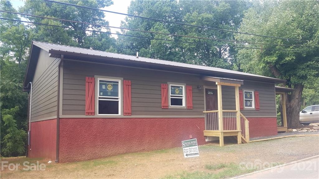 6722 Old Clyde Road Canton, NC 28716 - Photo 1 of 27 a backyard of a house